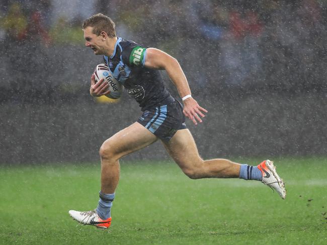 Tom Trbojevic sprints away for his third try. Picture: Brett Costello