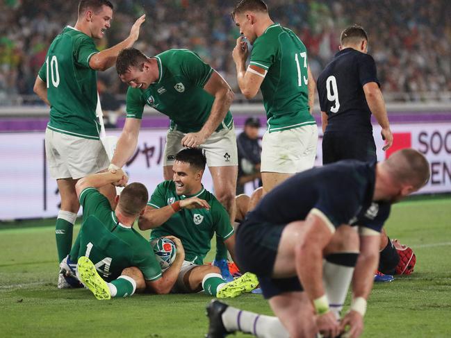 YOKOHAMA, JAPAN - SEPTEMBER 22: Andrew Conway of Ireland celebrates scoring his side's fourth try with his team mates during the Rugby World Cup 2019 Group A game between Ireland and Scotland at International Stadium Yokohama on September 22, 2019 in Yokohama, Kanagawa, Japan. (Photo by Stu Forster/Getty Images)