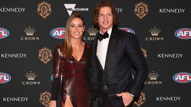 If you missed it between all the betting ads, Nat Fyfe of the Fremantle Dockers, with partner Eleanor Brayshaw, took home his second Brownlow Medal. Picture: AAP Image/Julian Smith