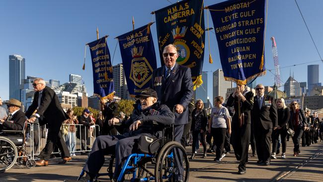 Veterans take part in the Anzac Day Parade along the Princes Bridge. Picture: Getty Images