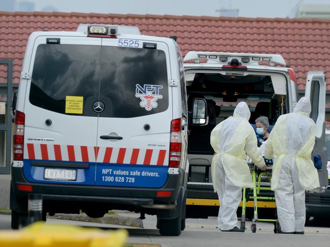 MELBOURNE, AUSTRALIA - NewsWire Photos JULY 27: Medical staff remove patients from St Basil's Home for the Aged at Fawkner. Picture: NCA NewsWire / Andrew Henshaw