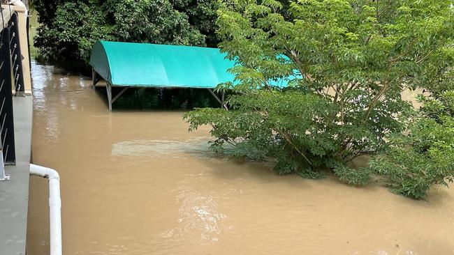 Logan's worst roads: Logan River Tree Farm at Beenleigh on Chapman Dr, Beenleigh. The canopy of the nursery shed is all that is visible.