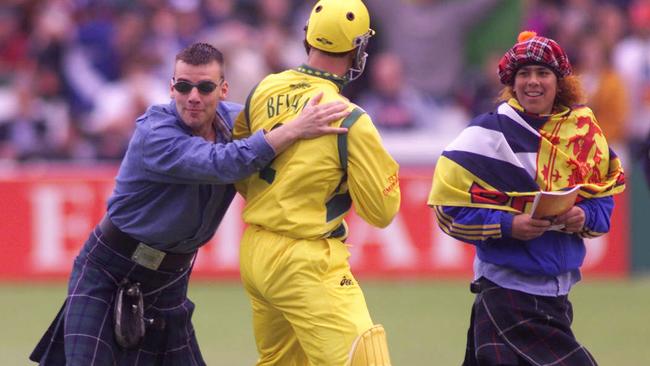 Scottish supporters grab hold of Michael Bevan after their group 2 match Scotland v Aust in Worcester at the 1999 World Cup. Picture: David White