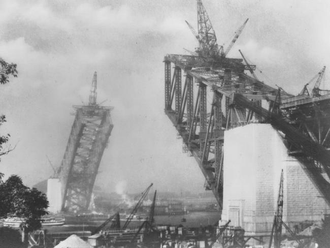 Sydney Harbour Bridge under construction in 1930, two years before it opened. Picture: Stanton Library Collection