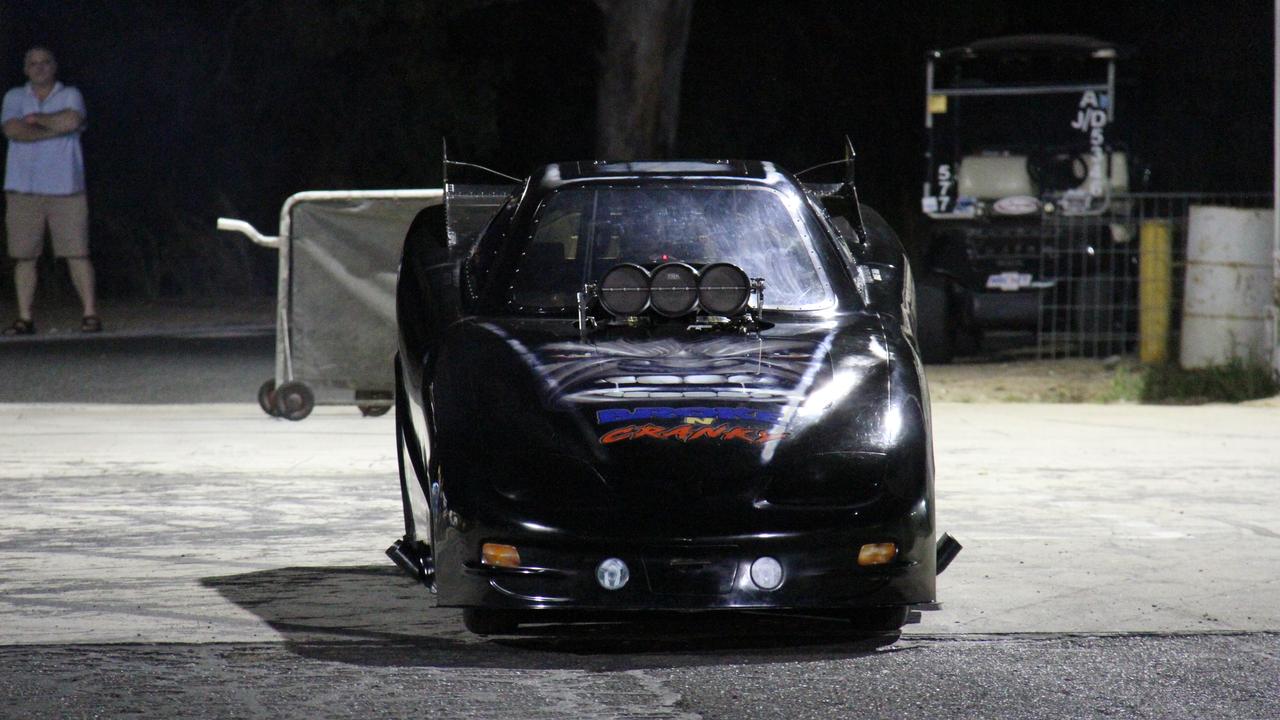 John Bayliss lines up for a demonstration pass in his methanol powered supercharged funny car Broke 'N Cranky at Benaraby dragway. Picture: Rodney Stevens