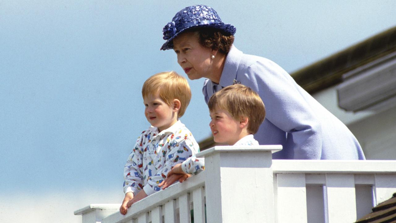 Prince Harry with Prince William and the Queen. Picture: Tim Graham Photo Library via Getty Images