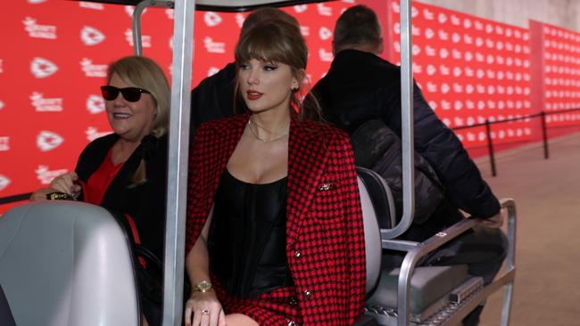 KANSAS CITY, MISSOURI - NOVEMBER 10: Taylor Swift rides on a golf cart prior to a game between the Kansas City Chiefs and the Denver Broncos at GEHA Field at Arrowhead Stadium on November 10, 2024 in Kansas City, Missouri. (Photo by Jamie Squire/Getty Images)