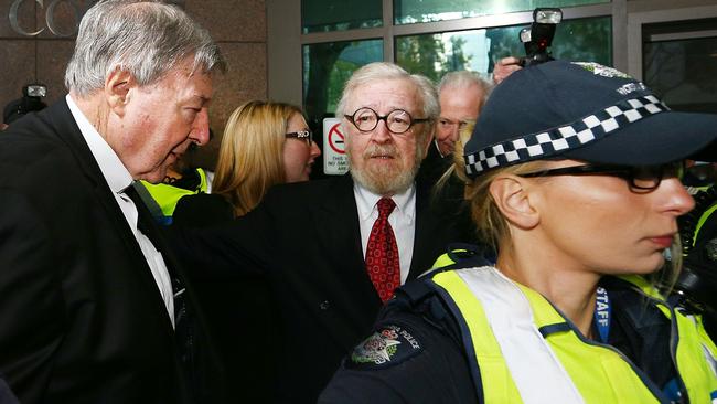 Cardinal George Pell, left, with his defending lawyer Robert Richter QC at Melbourne Magistrates' Court. Picture: Getty Images.