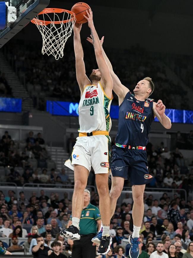 Brad Newley of Melbourne United attempts to defend as JackJumpers forward Jack McVeigh scores during the round 8 NBL match at John Cain Arena, on November 26, 2022. Picture: Morgan Hancock/Getty Images