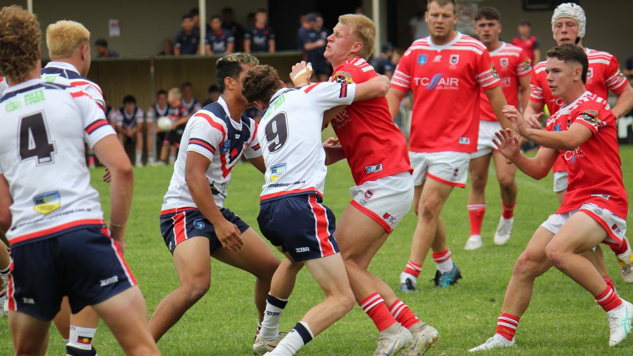 Dreau Clark takes a hit up for the Illawarra South Coast Dragons Laurie Daley Cup team. Picture: Kevin Merrigan
