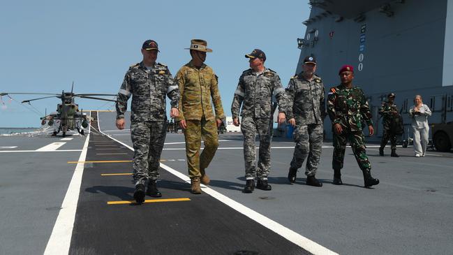 Australian Defence Force and Indonesian National Armed Forces members aboard the HMAS Adelaide ahead of Exercise Keris Woomera. Picture: Zizi Averill