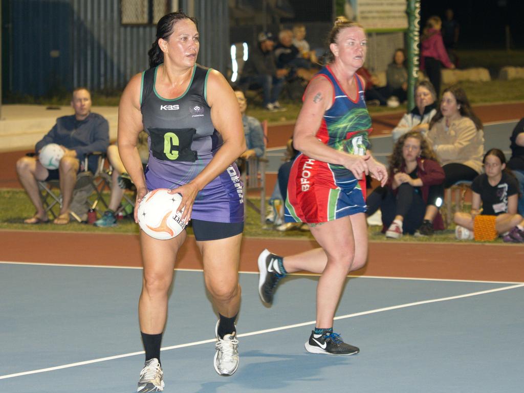 Melissa Ferrier scoots behind Phoenix player Meraine Ford in the 2021 Mackay Netball Association seniors grand final. September 4th, 2021 Picture: Marty Strecker