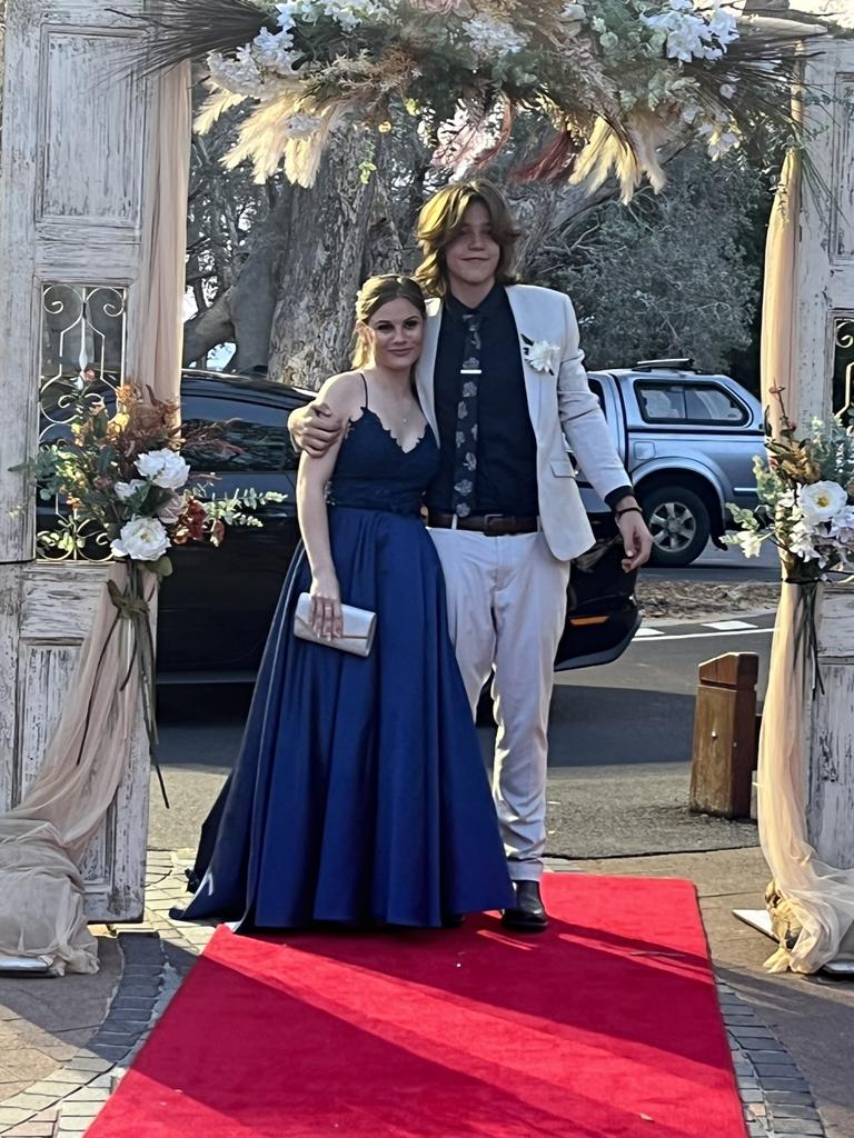Alyssa Lusk and Liam Campbell arrive at Hervey Bay High School's formal.