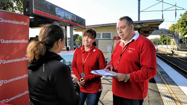 Queensland Rail Community Engagement Team members Alex Purnell and Lyndon James chat about the planned upgrade of East Ipswich Railway Station. Picture: Rob Williams