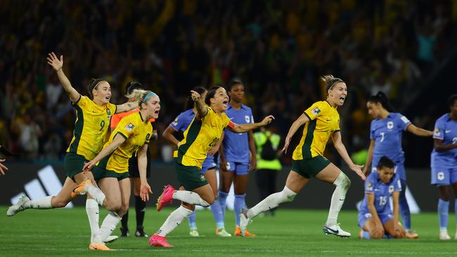 Matildas players celebrate after their epic quarter-final win. Picture: Lachie Millard