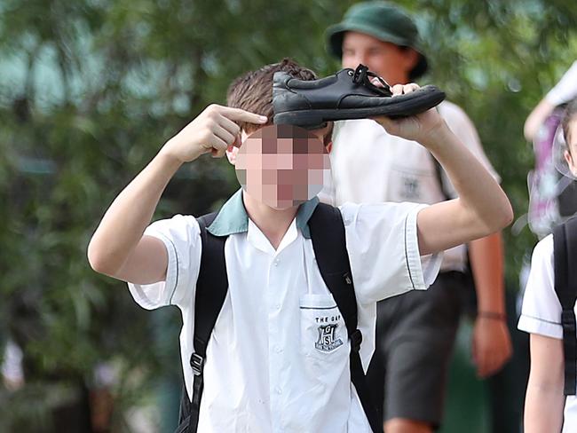 A student at The Gap High accentuates his footwear yesterday. Picture: Peter Wallis