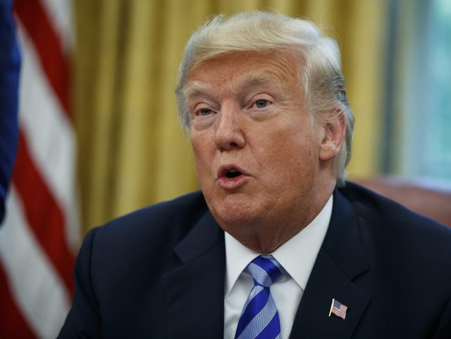 President Donald Trump speaks during a meeting with FIFA president Gianni Infantino and United States Soccer Federation Carlos Cordeiro in the Oval Office of the White House, Tuesday, Aug. 28, 2018, in Washington. (AP Photo/Evan Vucci)