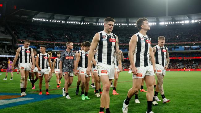 The Magpies leave the field after the match. Picture: Dylan Burns/AFL Photos