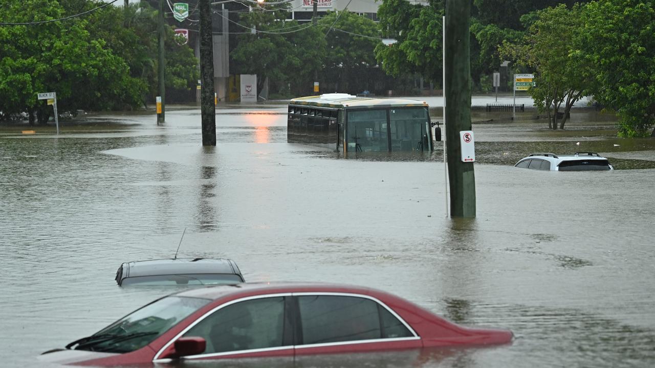 Cars and a bus underwater next to Suncorp Stadium over the weekend.