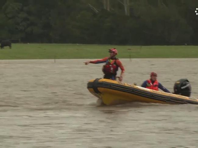 Search launched after car swept away in NSW floodwaters