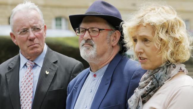 Kerry Finch, left, Rob Valentine and Ruth Forrest gave a press conference on parliament lawns. Picture: MATHEW FARRELL