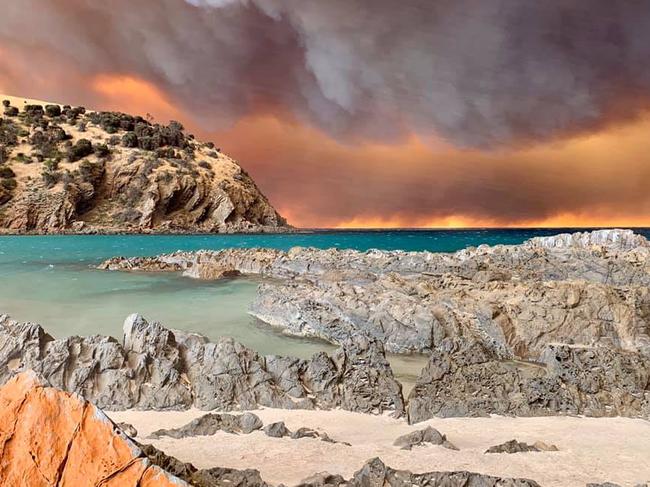 Photos of the Kangaroo Island fire as taken by Caroline Taylor taken from Western River Cove beach where she was sheltering, and earlier from her home before she was forced to flee.Picture: Caroline Taylor