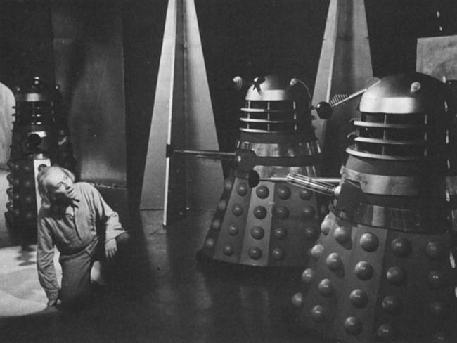 Doctor Who (William Hartnell) battles the Daleks in a scene from Doctor Who.