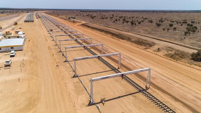 Aerial view of laid track and gantry with sleeper stockpile in the distance. Picture: Cameron Laird