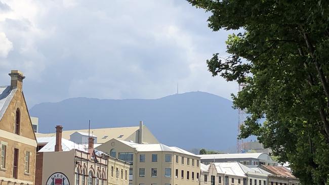 The bushfire smoke haze over Mt Wellington as viewed from Salamanca Place this afternoon. Picture: PHIL YOUNG