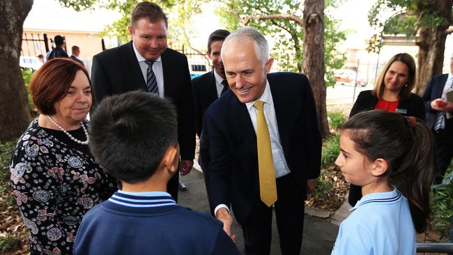 Prime Minister Malcolm Turnbull visits North Strathfield Public School with Minister for Education Simon Birmingham and Member for Reid Craig Laundy today. Picture: Toby Zerna