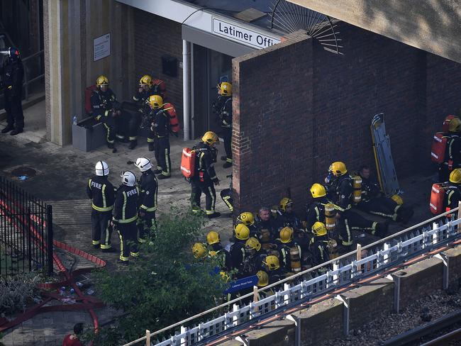 ‘I heard screams’. Firefighters were praised as heroes. Picture: Leon Neal/Getty Images