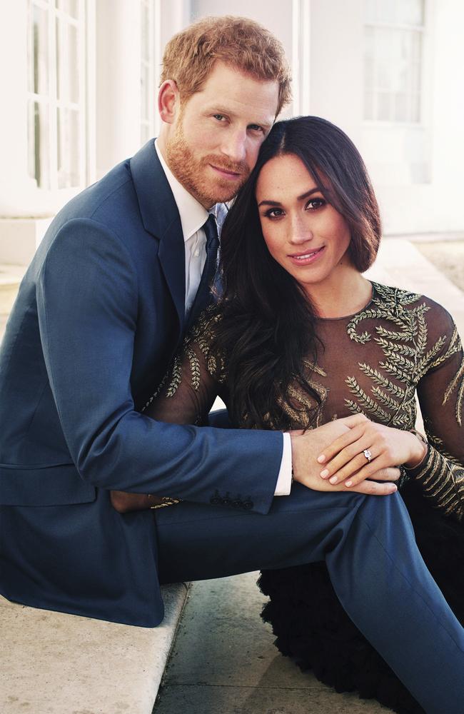 Prince Harry and Meghan Markle pose for one of two official engagement photos, at Frogmore House, in Windsor, England. Picture: Alexi Lubomirski via AP