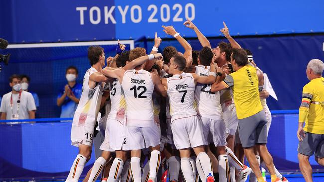 The Belgium players celebrate their gold medal. Picture: Adam Head