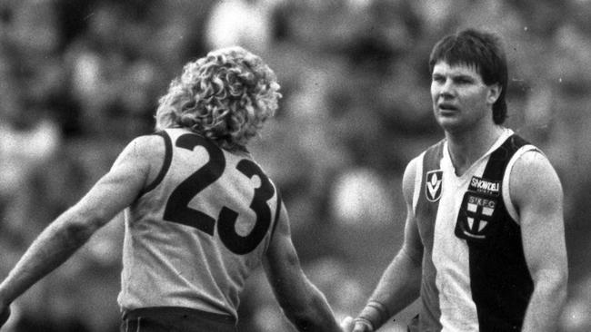 Dermott Brereton and Danny Frawley shake hands after one of their fierce battles.