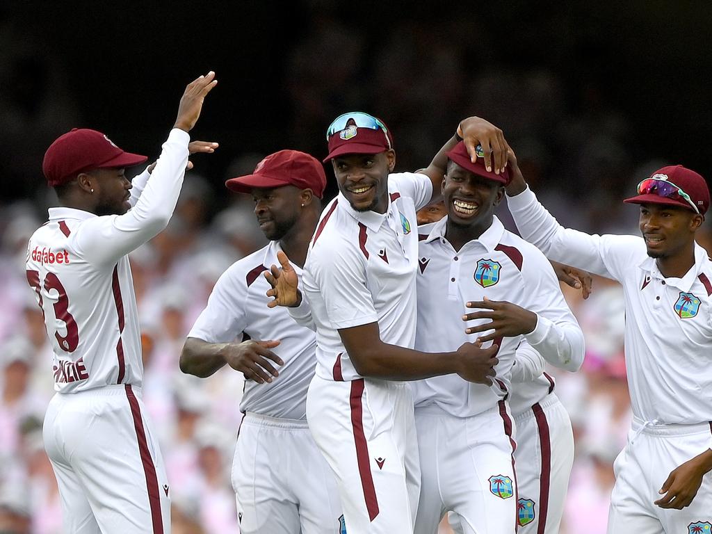 Kevin Sinclair is congratulated after catching Marnus Labuschagne. Picture: Bradley Kanaris/Getty Images