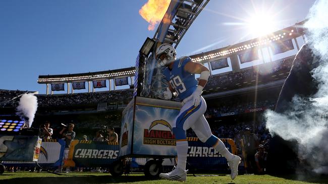 Joey Bosa #99 of the San Diego Chargers enters the field.