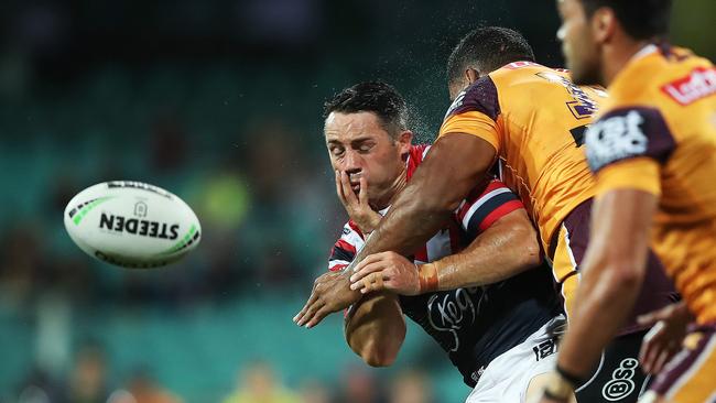 Cooper Cronk was hit late by Tevita Pangai Jnr. Picture. Phil Hillyard