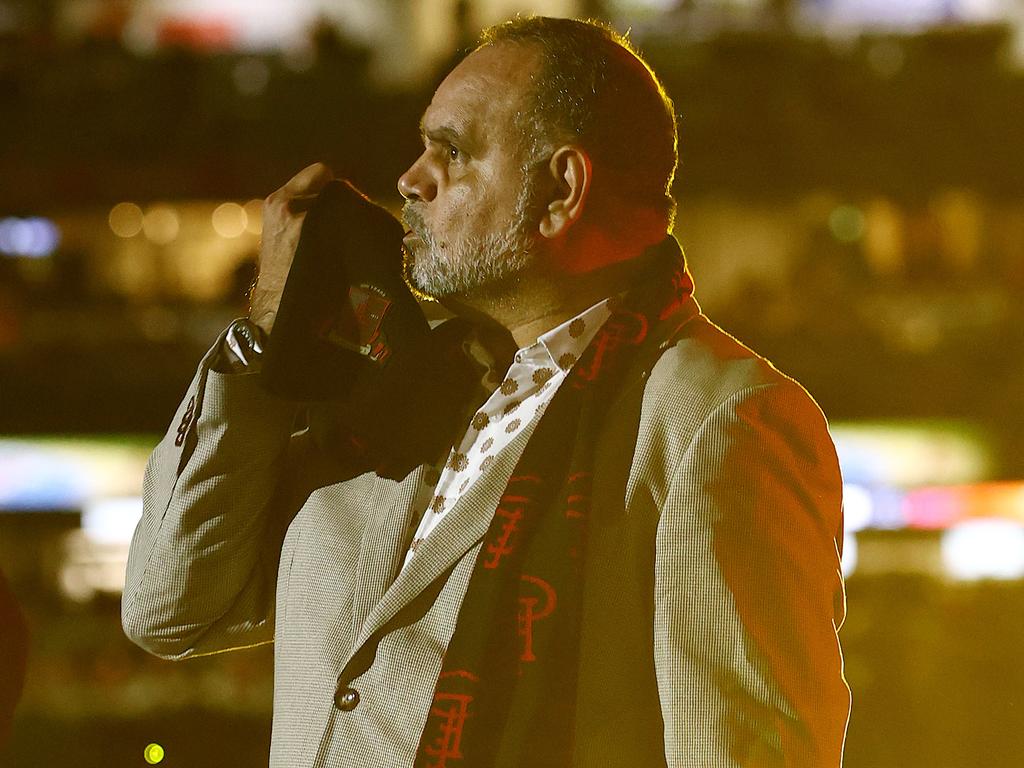 Michael Long kisses his Essendon scarf. Picture: Michael Klein