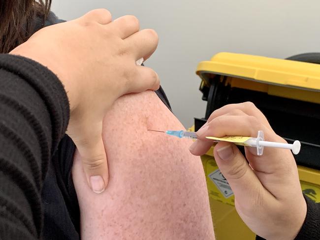 Daily Mercury editor Rae Wilson getting her Covid-19 Pfizer vaccination at the new vaccination hub at CQUniversity's Mackay city campus. Generic, covid, jab, needle, vaccine, Pfizer, covid Mackay, coronavirus.