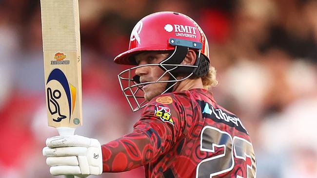 MELBOURNE, AUSTRALIA - JANUARY 18: Jake Fraser-McGurk of the Renegades raises his bat after scoring a half century during the BBL match between Melbourne Renegades and Brisbane Heat at Marvel Stadium, on January 18, 2025, in Melbourne, Australia. (Photo by Mike Owen/Getty Images)