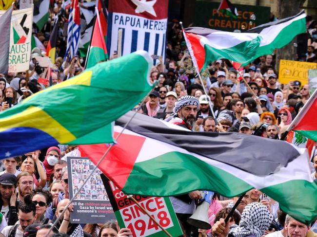 Pro-Palestinian protesters gather at a rally in Melbourne on Sunday, October 6, 2024.