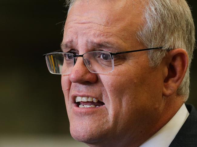 SYDNEY, AUSTRALIA - NewsWire Photos, DECEMBER 17 2021: Prime Minister Scott Morrison visits Opie Manufacturing and addresses the media in Sydney. Picture: NCA Newswire / Gaye Gerard