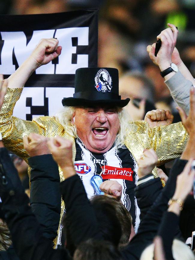 Joffa celebrates with Pies fans during Collingwood’s win over Richmond in the 2018 preliminary final.