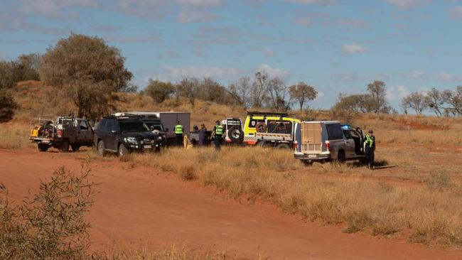 Emergency services at the scene of the crash at Finke Desert Race where one person died and two others were injured. Picture: Supplied