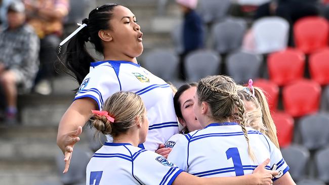 NSWCCC players celebrate a tryGirls NSWCCC Vs Victoria in the ASSRL national championships in Redcliffe.Saturday July 1, 2023. Picture, John Gass