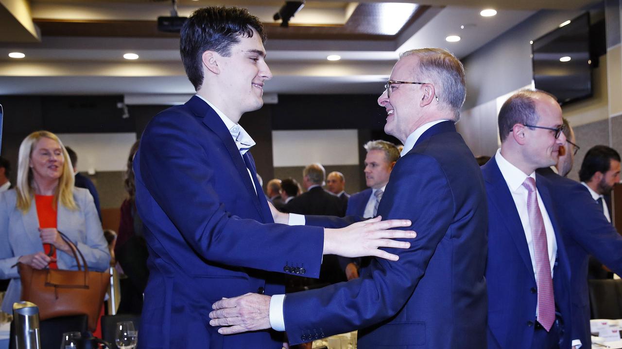 Mr Albanese is greeted by his son Nathan after his speech. Picture: Sam Ruttyn