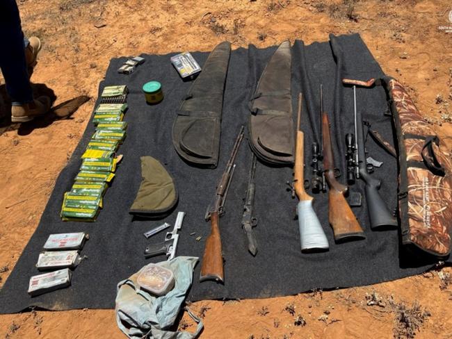 A Flinders Ranges man will face serious firearms charges after a search of his property uncovered a cache of buried weapons. Picture SA Police