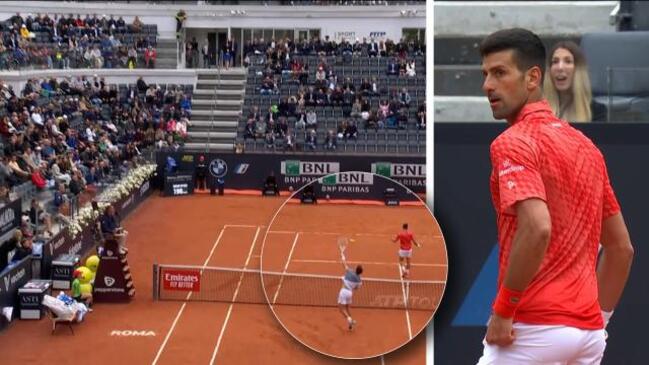 Novak Djokovic stares down Cameron Norrie after overhead