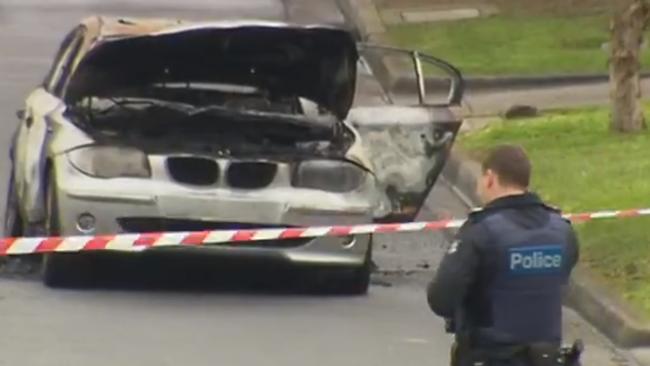 Police at the scene where the car was dumped.