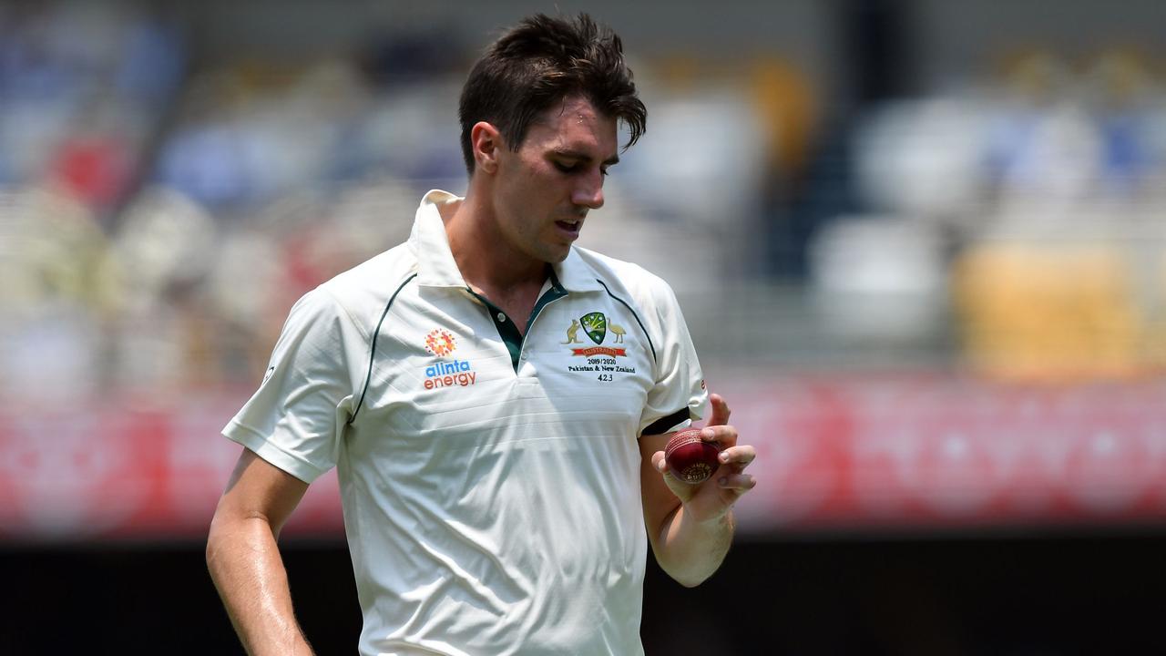 Australia's paceman Pat Cummins says cricketers may not be able to add saliva to the ball to get better swing. (Photo by Saeed KHAN / AFP)